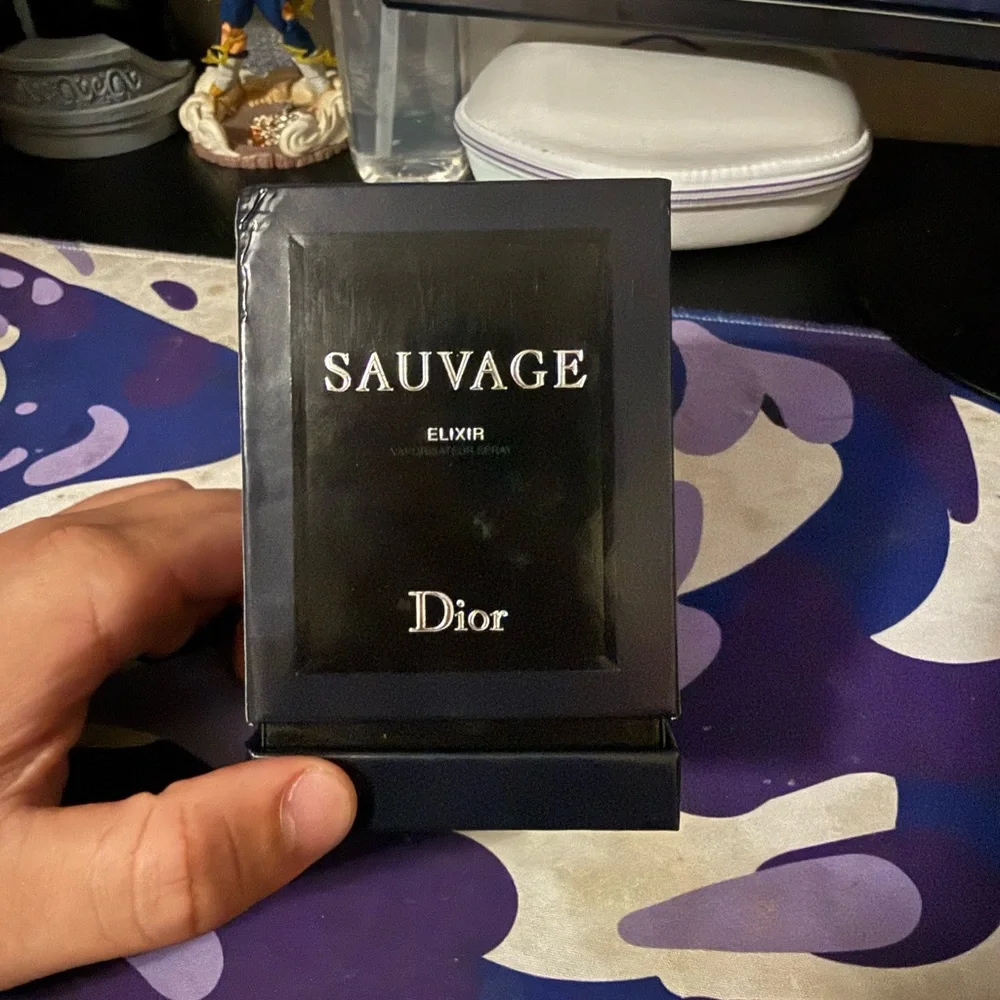 Dior Black Camera Lens Cap with Gloss Finish